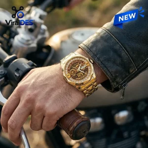 Indian Motorcycle 125th Anniversary Quartz Watch featuring a gold-toned metallic band and ornate dial on a rider's wrist.