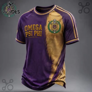 Premium Omega Psi Phi Purple and Gold Shirt featuring fraternity text, a crest emblem, and decorative script on fabric.