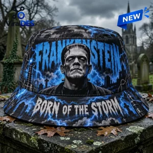 Front view of the Frankenstein Born of the Storm Blue Bucket Hat featuring a black and white monster portrait and lightning graphics.