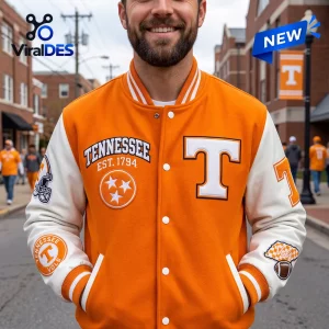 Front view of a Tennessee Volunteers Orange Baseball Bomber Jacket worn on a campus street.