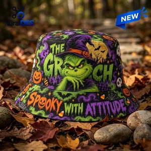 Front view of The Grinch Halloween Witch Hat Bucket Hat outdoors on autumn leaves.