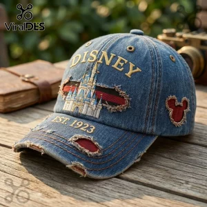 Disney Magic Kingdom Vintage Distressed Denim Cap featuring an embroidered castle, red accents, and frayed fabric edges.