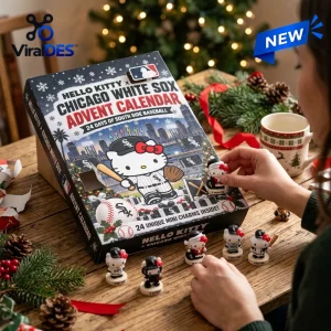 Close-up view of a person opening the Hello Kitty x Chicago White Sox Advent Calendar on a wooden table.