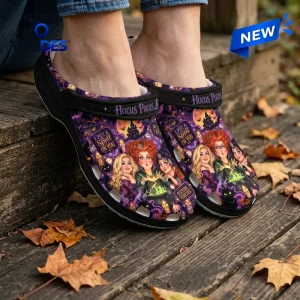 Close-up view of Hocus Pocus Sanderson Sisters Halloween Crocs Clogs featuring witch graphics and purple themed patterns.