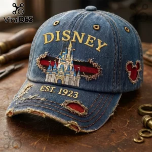 Disney Magic Kingdom Vintage Distressed Denim Cap with embroidered castle logo and EST. 1923 text on blue cotton fabric.