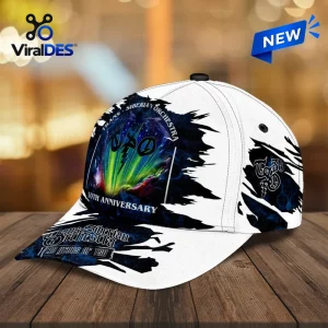 Trans-Siberian Orchestra 30th Anniversary Cap featuring a white base with a blue nebula graphic and logo on a wood table.