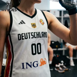 Germany Basketball 2026 FIBA Women World Cup white jersey featuring black trim, national emblem, and sponsor branding.