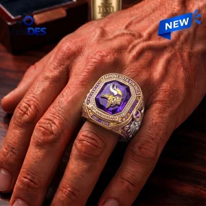 Closeup of a Minnesota Vikings 65th Anniversary Championship Ring worn on a hand.