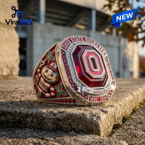 Closeup of Ohio State Buckeyes 136th Anniversary Red Crystal Ring featuring a large red center stone and mascot on the side.