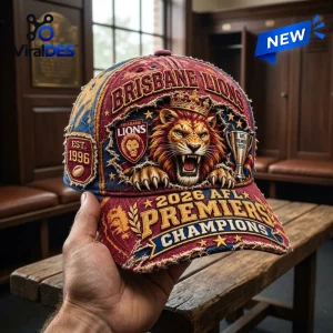 Hand holding the Brisbane Lions 2026 AFL Premiers Champions Distressed Cap.