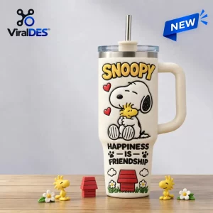 Front view of Snoopy Happiness Is Friendship Stanley Tumbler 40oz with cartoon graphic.