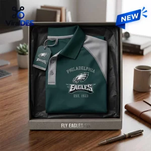 Philadelphia Eagles Two Tone Performance Polo Shirt in green and silver with team logo in a branded display gift box.