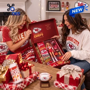 Barbie x Kansas City Chiefs Acrylic Plaque featuring a doll in team gear inside a red collector box held by two women.