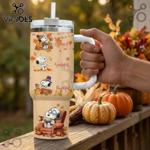 Snoopy Thanksgiving Fall Leaves 40oz Tumbler with cartoon illustrations of Snoopy, pumpkins, and autumn foliage themes.