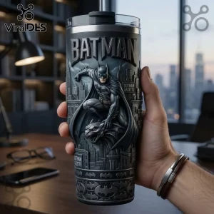 Batman Embossed Stainless Steel Tumbler featuring a 3D Batman figure crouching over Gotham City against a grey background.