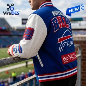 Rear view of an NFL Buffalo Bills Football Varsity Baseball Jacket in blue and white with red lettering at a stadium.