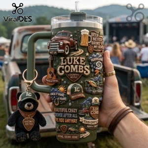 Luke Combs Embossed Green 40oz Tumbler with country music iconography and truck graphics held against a blurred background.
