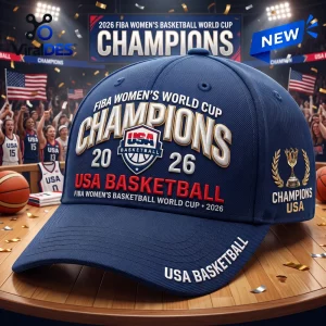 USA Basketball 2026 World Cup Champions navy baseball cap with gold embroidered text and championship trophy logo graphic.