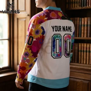 Cincinnati Cyclones Floral Pride Hockey Jersey featuring white body, bright multi-colored floral sleeves, and custom text.