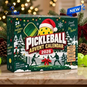 Front view of the Pickleball Advent Calendar 2026 box with holiday graphics and silhouettes of players.
