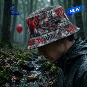 Side view of Pennywise You'll Float Too Horror Bucket Hat worn outdoors near a rainy stream.