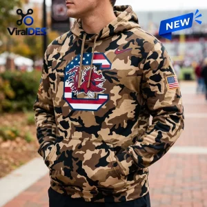 South Carolina Gamecocks Camo Military Appreciation Hoodie featuring a mascot logo and American flag patch on the sleeve.