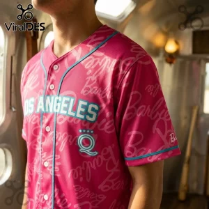 Los Angeles Queens x Barbie Game Day Baseball Jersey featuring hot pink fabric, teal piping, and white logo lettering.