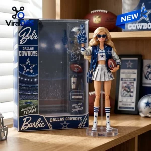 Barbie Dallas Cowboys Cheerleader Acrylic Plaque beside boxed doll wearing blue and silver uniform with a football.