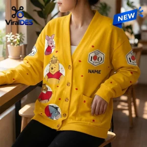 Winnie the Pooh 100th Anniversary yellow knitted cardigan featuring character patches, button front, and custom text area.