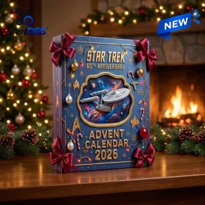Front view of the blue Star Trek 60th Anniversary Advent Calendar on a wooden table with Christmas decor.