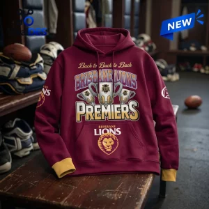 Front view of the Brisbane Lions AFL Three-Peat Premiers maroon hoodie resting on a wooden bench.