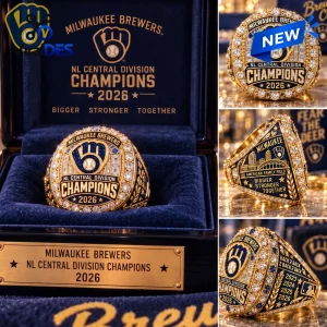 Detail views of a gold Milwaukee Brewers 2026 NL Central Division Champions ring with stadium and championship text.