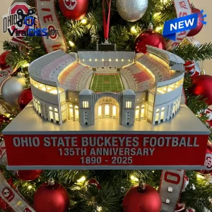 Ohio State Buckeyes 135th Anniversary Christmas Ornament featuring a lit miniature Ohio Stadium model on a red pedestal.