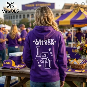 LSU Tigers Lainey Wilson College GameDay Purple Hoodie worn by a woman with white text and stars graphic on the back.