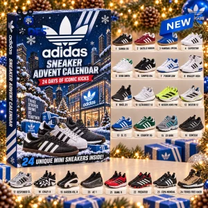 Front view of an Adidas Sneaker Advent Calendar showing 24 numbered miniature shoe models in a winter city setting.