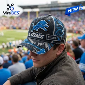Side view of a person wearing a Detroit Lions NFL distressed baseball cap in a stadium.