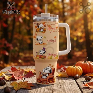 Snoopy Thanksgiving Fall Leaves 40oz Tumbler with straw featuring Peanuts characters, pumpkins, and autumn foliage.