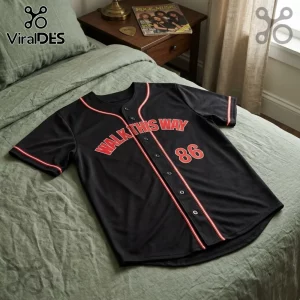 Aerosmith x Run DMC Walk This Way black baseball jersey featuring red lettering and the number 86 on a green bedspread.