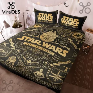 Star Wars 50th Anniversary Millennium Falcon duvet set with gold technical line art patterns on a black background.