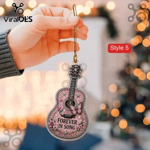 Dolly Parton Pink Rhinestone Acrylic Ornament Set featuring a guitar-shaped design with floral motifs and text.