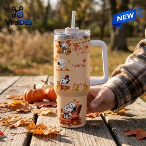 Snoopy Thanksgiving Fall Leaves 40oz tumbler with handle and straw featuring Peanuts characters and harvest graphics.