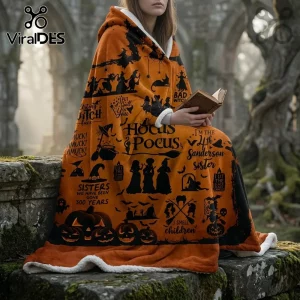 Hocus Pocus Sanderson Sisters hooded blanket in orange featuring black witch silhouettes, pumpkins, and movie quotes.