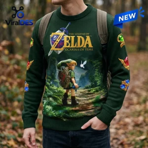 Front view of a green long-sleeve sweater featuring a forest landscape graphic and text from The Legend of Zelda.