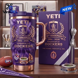 Fremantle Dockers 32nd Anniversary Stanley Tumbler in purple with copper accents, anchor logo, and commemorative text.