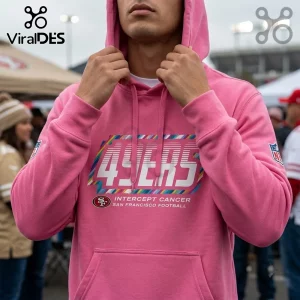 San Francisco 49ers NFL Crucial Catch pink hoodie with multi-colored graphic text on chest and NFL logo on sleeves.