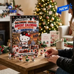 Lifestyle view of a Hello Kitty x Baltimore Orioles Advent Calendar on a wooden table with mini figures.