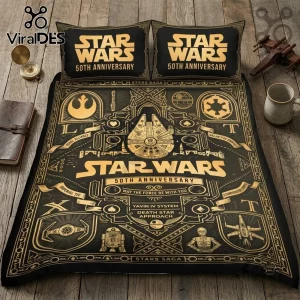 Star Wars 50th Anniversary Millennium Falcon duvet set in black and gold with iconic Rebel and Empire graphics.