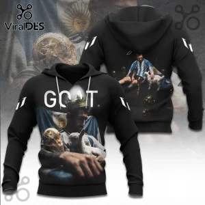 Lionel Messi Argentina National Football Team GOAT black hoodie featuring player with World Cup trophy and a goat graphic.