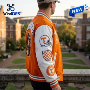 Side view of Tennessee Volunteers Orange Baseball Bomber Jacket featuring white sleeves with patches and ribbed striped trim.
