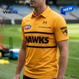 Hawthorn Football Club Gold Polo Shirt with black horizontal stripes, AFL logo, and team mascot on the sleeve.